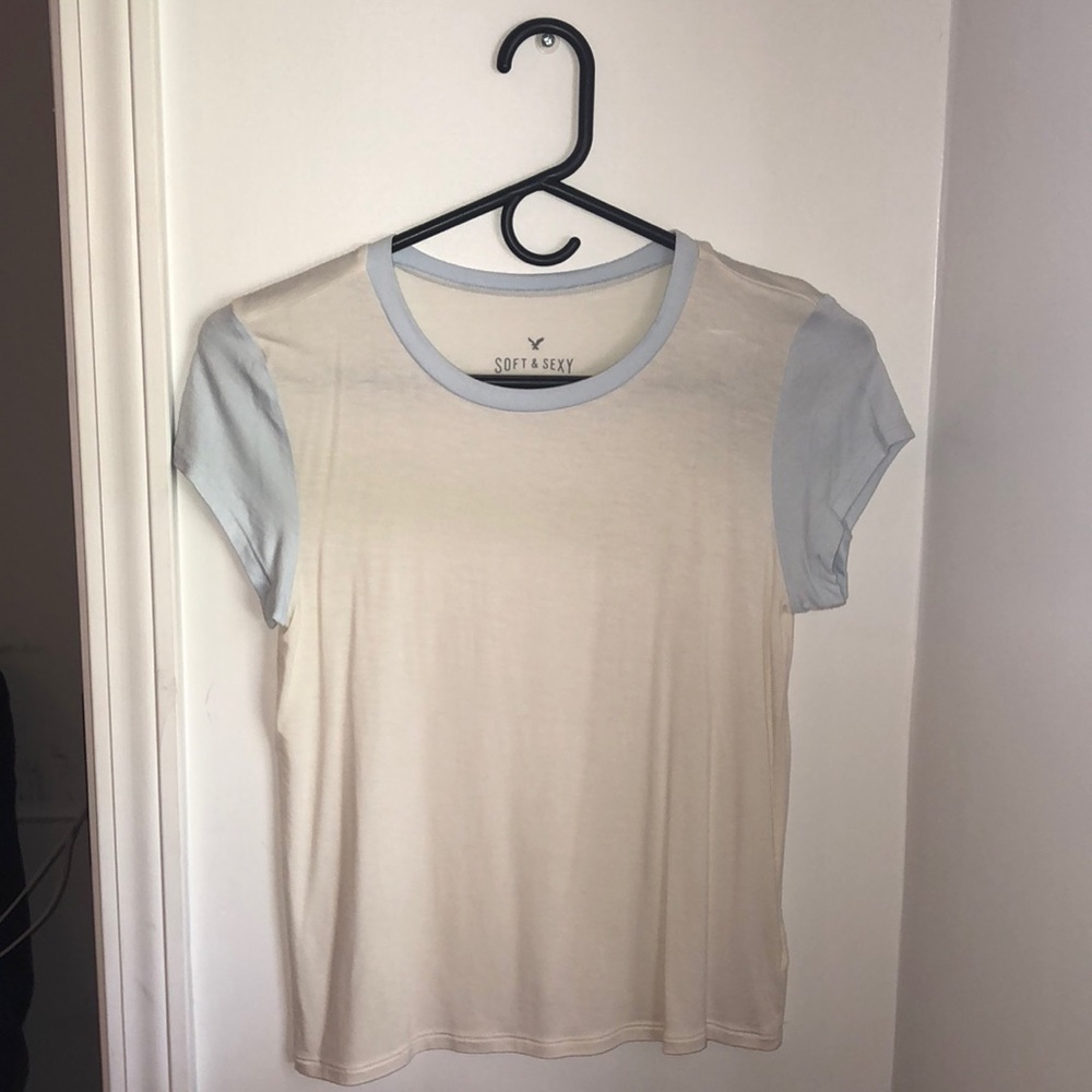 White tee with light blue trim